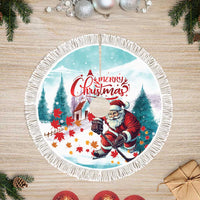 Mint round tree skirt with Santa hockey graphic and white tassel fringe border