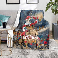 Holiday blanket standing on the floor with Santa riding a moose and “Merry Christmoose”