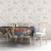 Blue tablecloth with forest silhouette and colorful autumn leaves