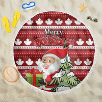 Red round fringed Christmas beach blanket with Santa, 'Merry Christmas' and maple leaf pattern