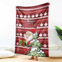 Red Christmas blanket with Santa holding a gift and pine tree, maple leaf and stripe pattern