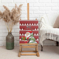Red Christmas canvas wall art with Santa and green dog, white maple leaf pattern on display