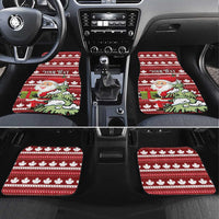 Red car floor mats with white maple leaf stripes and Santa holiday graphic; set of two
