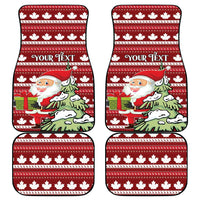 Set of four red car floor mats with Santa scene and white maple leaf pattern