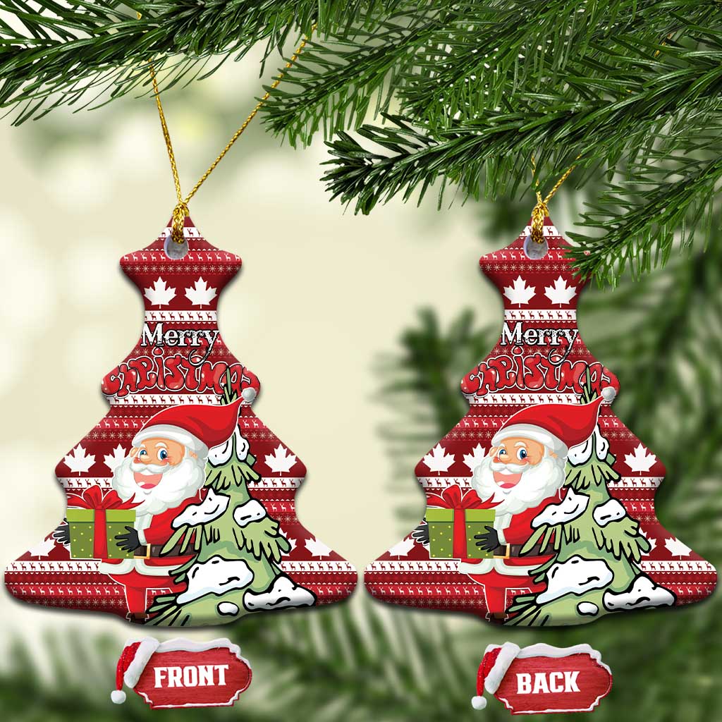 Red ceramic Christmas tree-shaped ornament with hanging loop; Santa and Merry Christmas on maple leaf pattern.