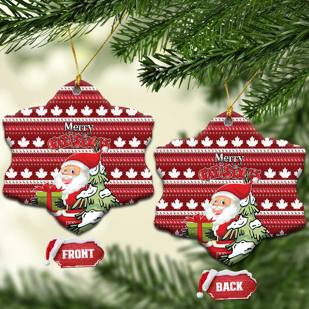 Red ceramic snowflake-shaped Christmas ornament with hanging loop; Santa and Merry Christmas on maple leaf pattern.