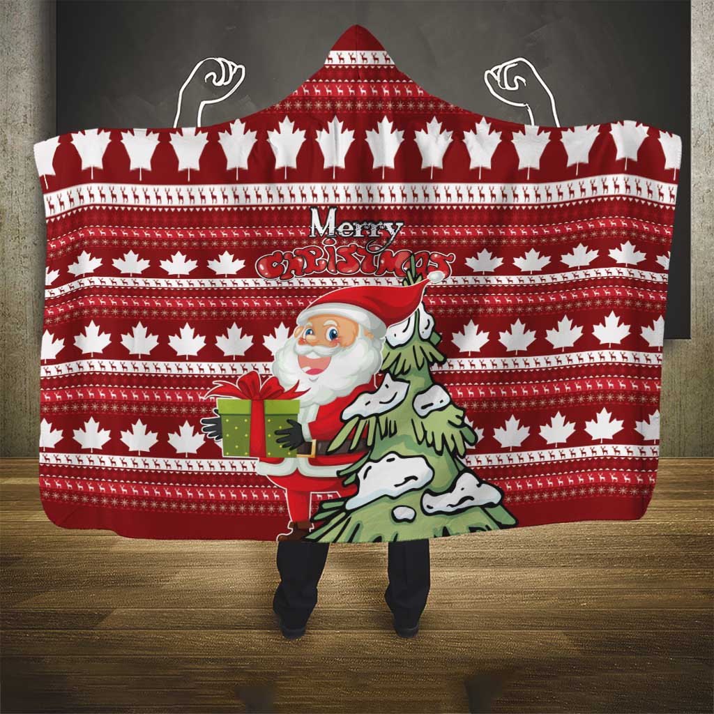 Red hooded blanket with white maple leaf border and Merry Christmas Santa print