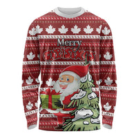 Unisex red long-sleeve Christmas shirt with white maple leaves, Santa, and 'Merry Christmas' text