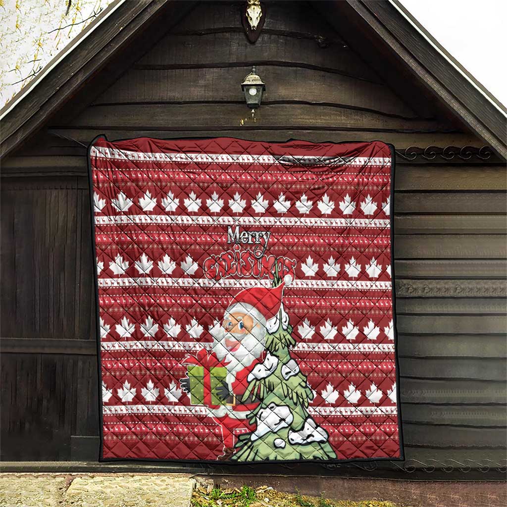 Red holiday quilt featuring maple leaves, Santa with a gift, and “Merry Christmas” phrase