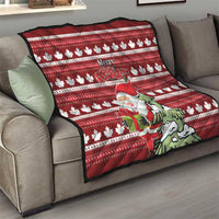 Red maple leaf Christmas quilt with Santa, green tree illustration, and “Merry Christmas” wording
