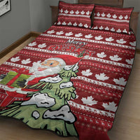 Red Christmas quilt bed set with Santa holding a gift, maple leaf and stripe pattern