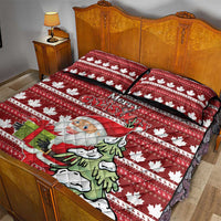 Red Christmas quilt bed set with Santa, maple leaves, and striped border