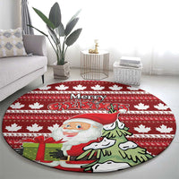 Red round Christmas area rug with maple leaf pattern, Santa holding tree and gifts