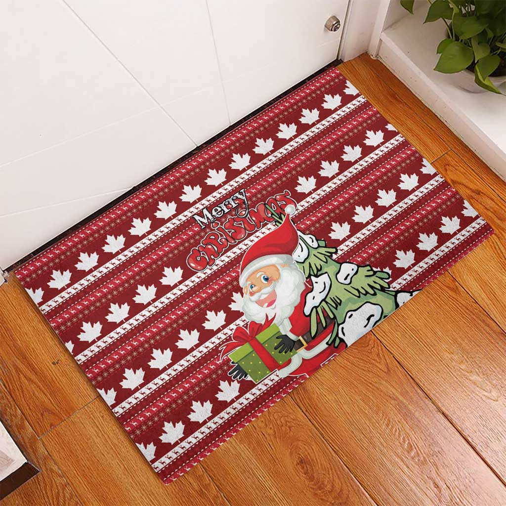 Red rubber Christmas doormat on floor with maple leaf pattern and Merry Christmas text