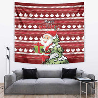 Red Christmas tapestry with white maple leaf pattern, “Merry Christmas” text, Santa with gift.