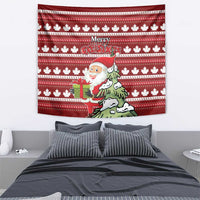 Red Christmas tapestry wall hanging with white maple leaves, “Merry Christmas,” Santa holding a gift.