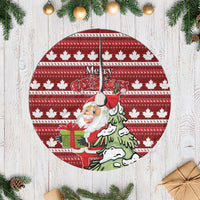 Red Christmas tree skirt with maple leaf pattern and Merry Christmas illustration