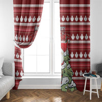 Red Christmas curtain panels with maple leaf pattern and cartoon Santa and tree scenes.