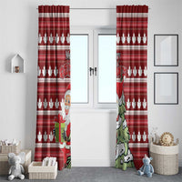 Red Christmas curtain panels with maple leaf print and Santa and tree character.