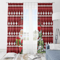 Red Christmas window curtains with maple leaf stripe pattern and hanging rings at top.