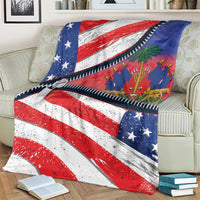 Haiti heritage zipper blanket on couch with red-white stripes, blue stars, and palm art