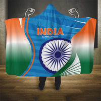 Blue hooded India Cricket blanket with large emblem graphic and orange/green accents