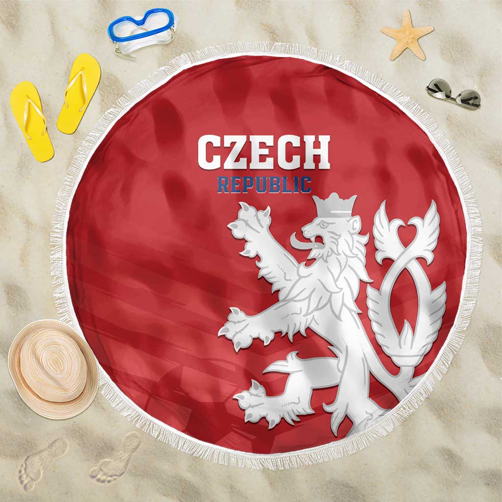 Red round beach blanket with fringed edge, white Czech crest, “CZECH REPUBLIC” text