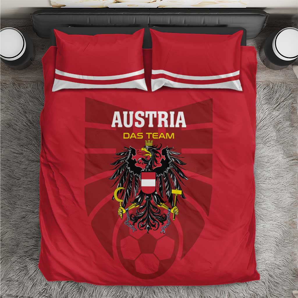 Red Austria football-themed bedding set with matching pillows and central crest design.