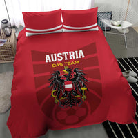Red Austria football bedding set featuring crest emblem, soccer ball motif, and striped pillow cases.