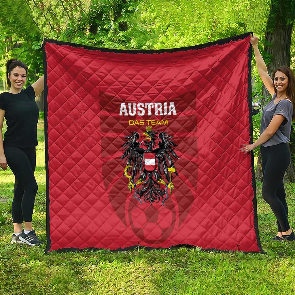 Red Austria team quilt blanket with center crest and 'AUSTRIA DAS TEAM' text