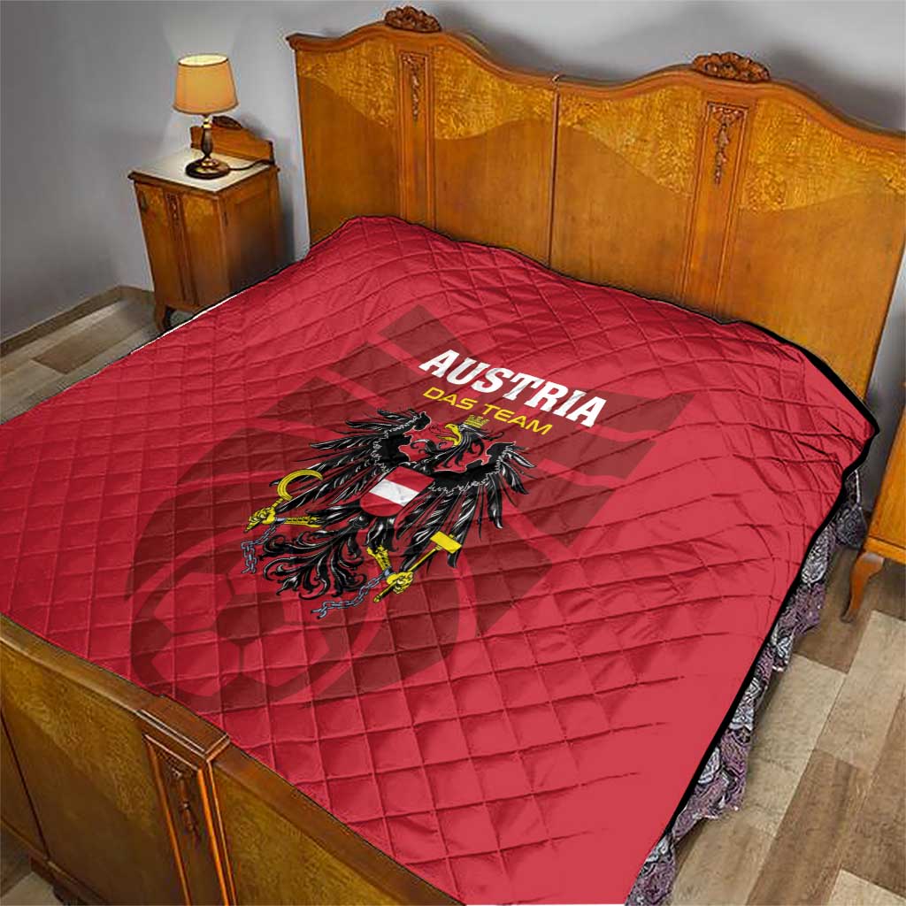 Red Austria team quilt blanket with black eagle crest and 'AUSTRIA DAS TEAM' text