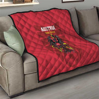 Red quilt blanket with diamond pattern, 'AUSTRIA DAS TEAM' and eagle crest