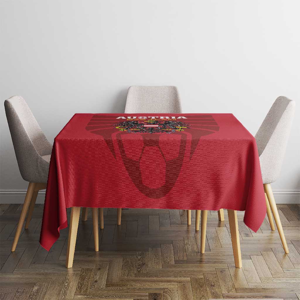 Red Austria 2024 football tablecloth with Austria shield-style logo on table