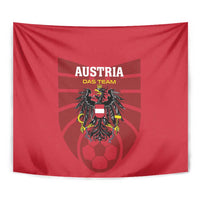Red Austria football team tapestry, close view of crest and 'DAS TEAM' lettering