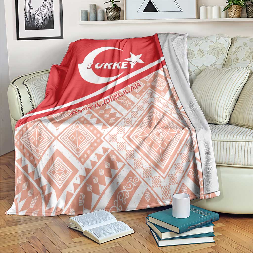 Red and peach Turkey football blanket with crescent star emblem and geometric pattern