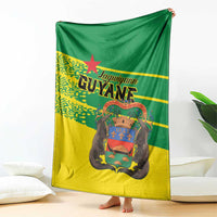 Large Guyane-themed blanket in yellow and green with French Guiana emblem center