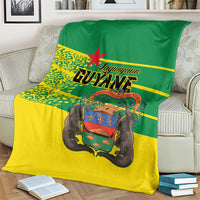 Guyane blanket in yellow and green featuring red star and French Guiana text