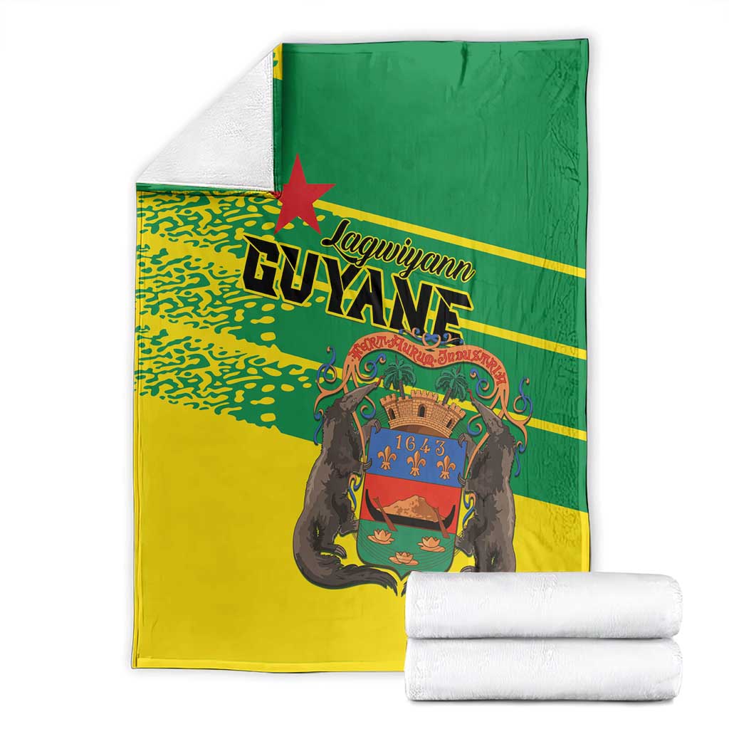Folded yellow and green Guyane blanket set with central portrait emblem and red star