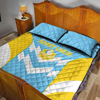 Saint Lucia quilt bed set on wooden bed frame with two matching pillow shams