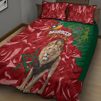 Quilt bed set with red and green lion design, Morocco emblem, and two red patterned pillows