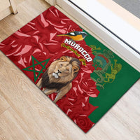Green and red rubber doormat with Morocco text, lion close-up and decorative bird