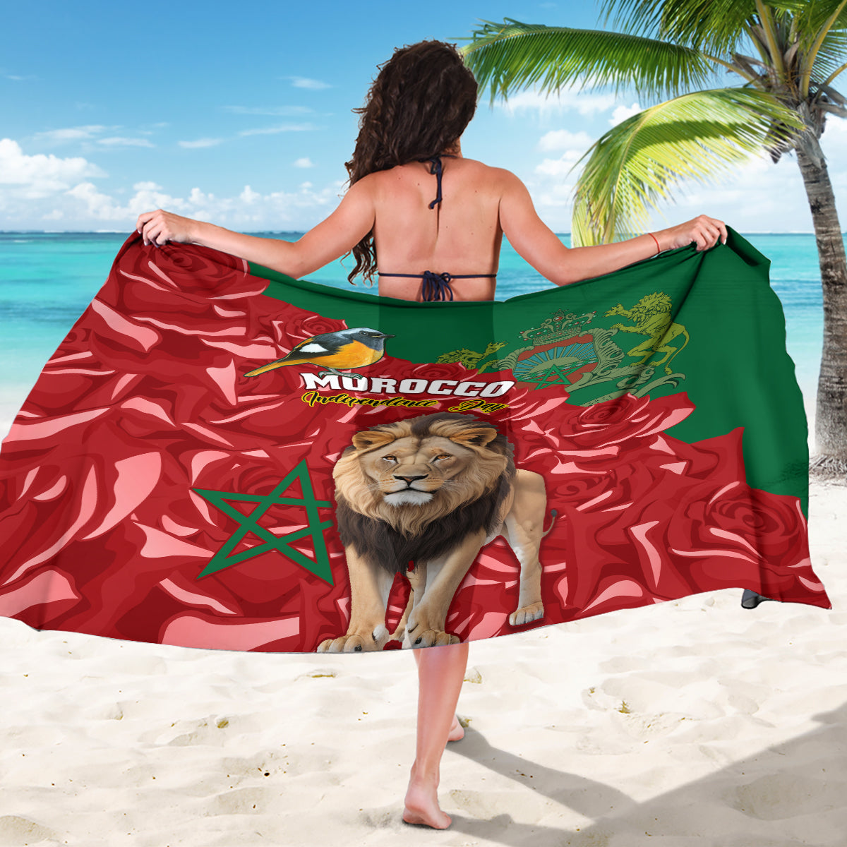 Printed Morocco sarong with lion and bird artwork on red-and-green flag pattern, draped.