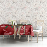 Red and green Morocco-themed tablecloth covering a dining table