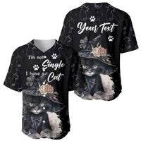 Two black baseball jerseys with cat graphics, bows, roses, and different text on fronts