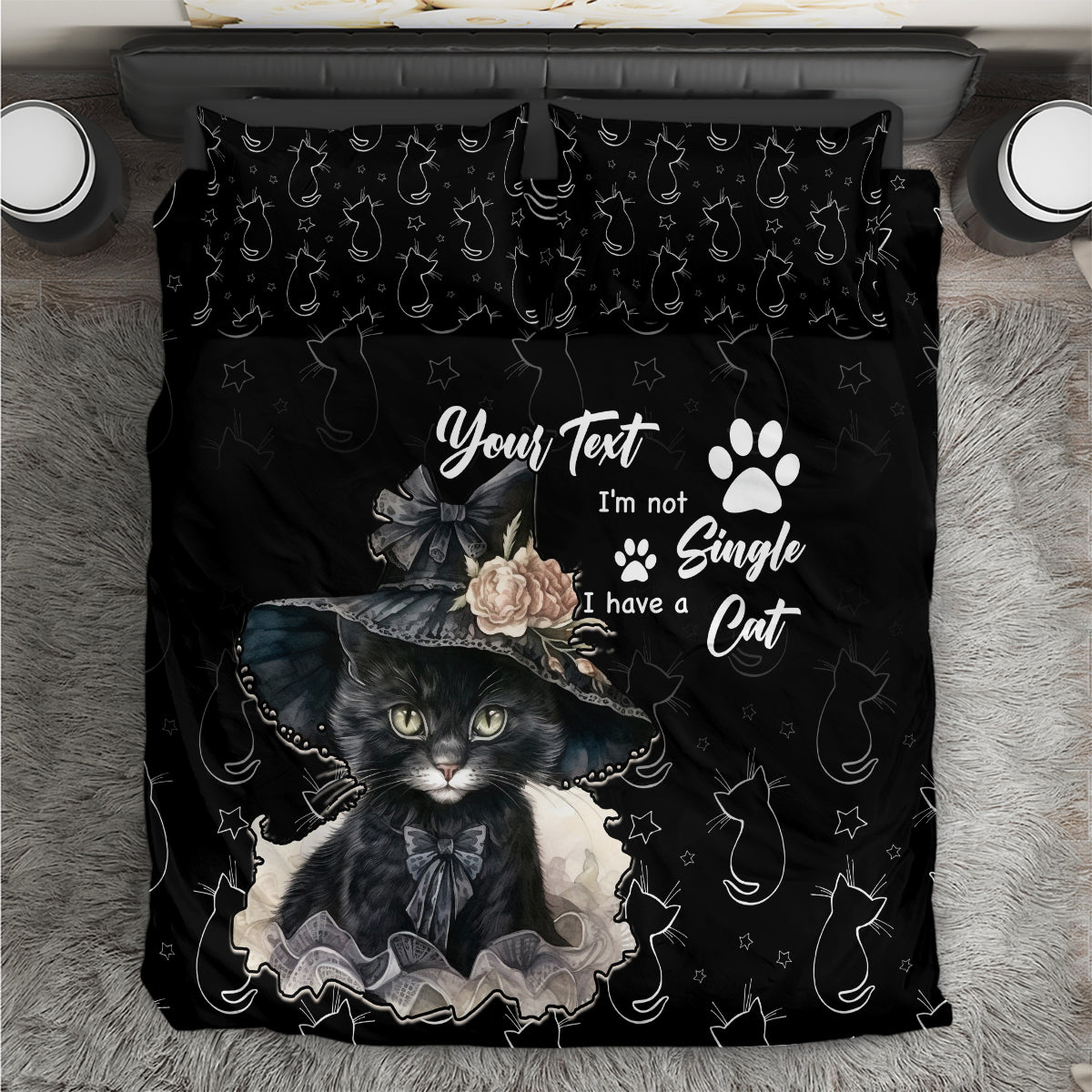 Black cat-themed bedding set with paw prints and large cat portrait design