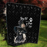 Black cat quilt blanket with quilted texture and central gray cat illustration with flowers