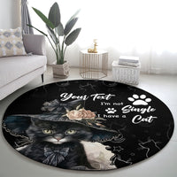 Black round cat-themed carpet with cat portrait, stars, paw prints, and rose detail
