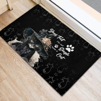 Black cat rubber doormat showing kitten face, paw pattern, and custom text