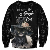 Unisex black sweatshirt with cat graphic and “I'm not Single I have a Cat” text