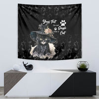 Black wall tapestry featuring a cat illustration in a hat with flowers and paw-print pattern